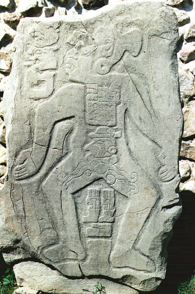 Mexico047.JPG - Sito Zapoteco di Monte Alban, stele che raffigura un parto podalico